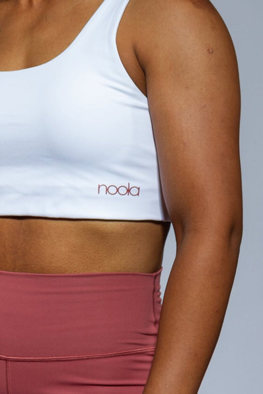 The Noola Classic Sports Bra - Buff Pink Logo